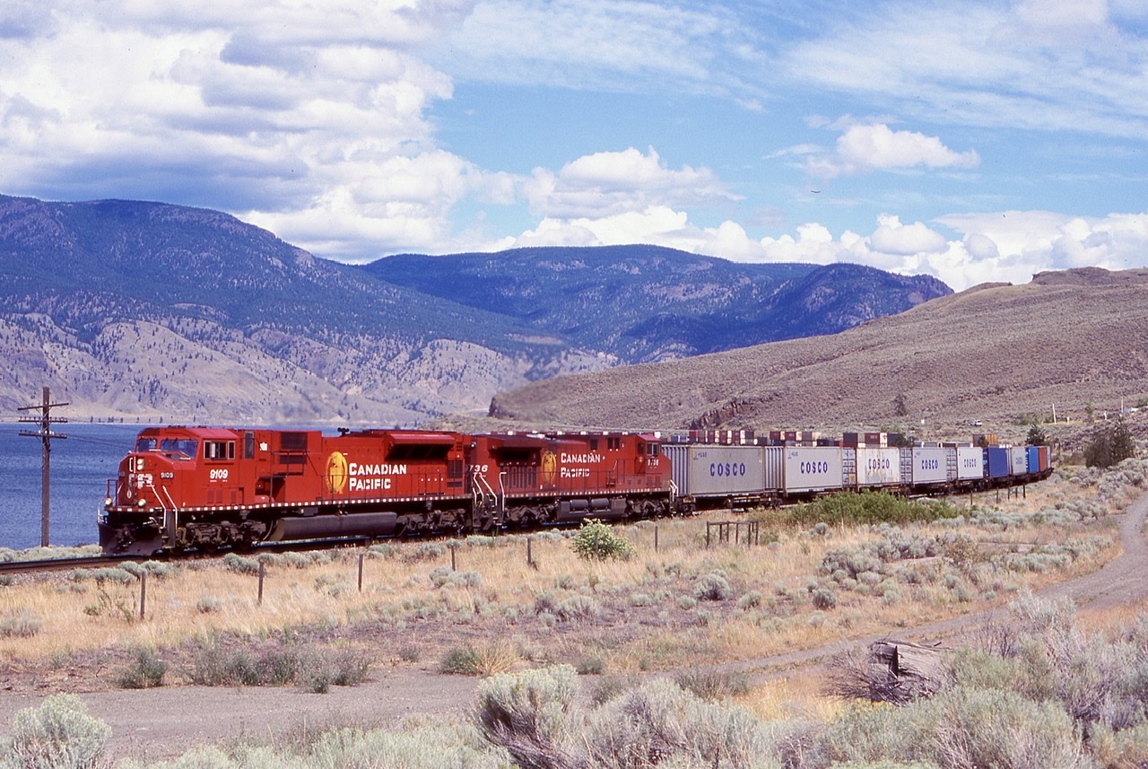 One of my favourite images from my second road trip out west almost 20 years ago now. We had CP’s SD90’s high on our list but of course GE’s dominated, especially in BC, nevertheless CP train 101 graced us with a SD90 leader so we followed it from Kamloops. As we drove through Savona  there was a nice sweeping “S” along Lake Kamloops so we set up at the end and waited a few minutes. It was unfortunate we could not get a bit of a higher elevation but I’m not complaining, we had a nice backdrop.