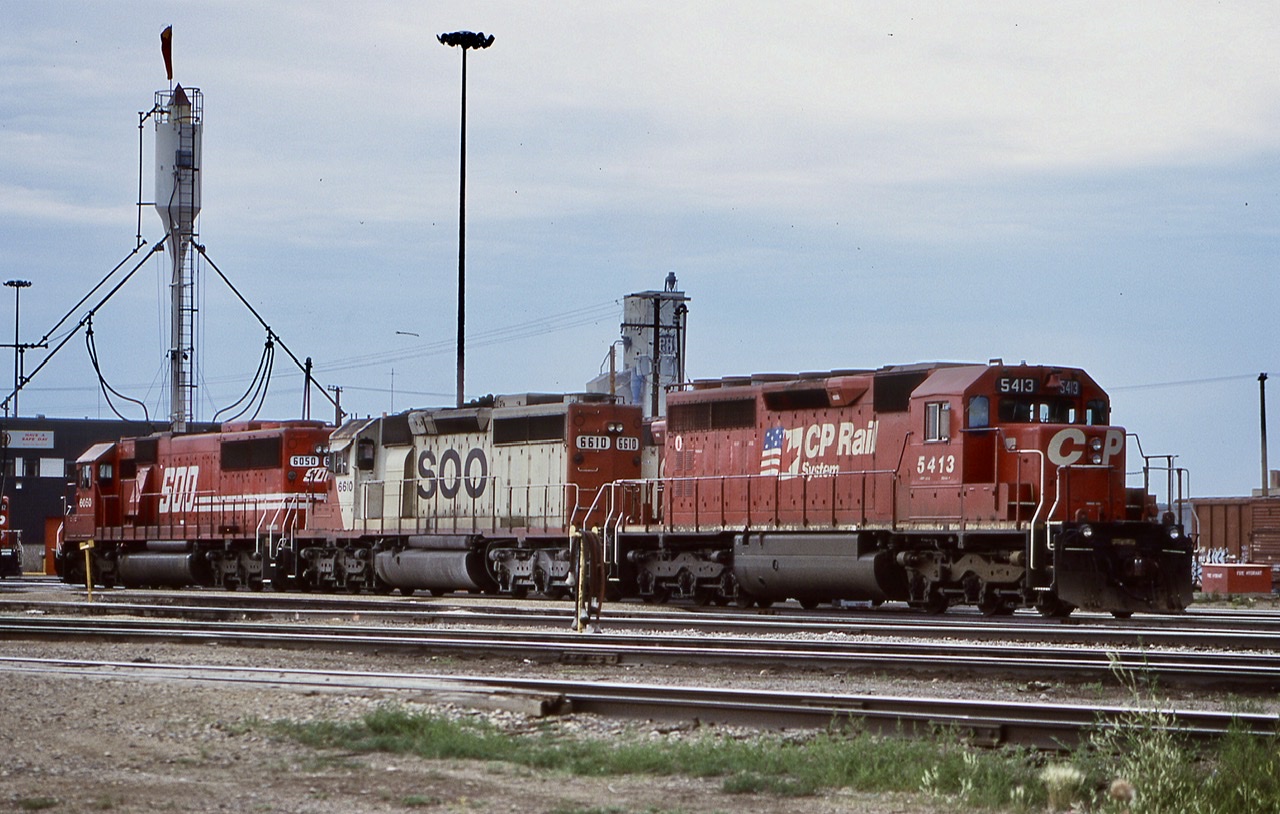Moose Jaw back in the early 2000’s was a very interesting terminal on CP. The engine house  was very busy and there was a lot of variety in the yard. Everything from run of the mill GE’s and SD40’s to SD90’s and GP 9’s. I always took a liking to the group of bulky former QNS&L SD40’s with their oversized fuel tanks. Unfortunately this is the only one I ever got a shot of before they were retired. Interestingly several would end up on the DME and later return to CP after the DME was absorbed. Unfortunately by then the oversized fuel tanks had been replaced. In this consist 5413 is joined by SOO SD40-2 6610. Another interesting group of units, many later in their careers had dynamic brakes installed. Some all
So we’re retuned by CP to their leasing company only to be once again snapped up by CP. By that time they still wore SOO colours, but CP reporting marks. Years later some were sold off while others were placed into hump service across the system. The last unit, SOO 6050, today wears CP paint and a new number 6250.