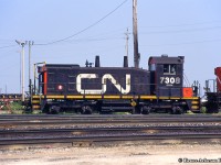 CN SW1200RSu 7308 sits near the shop at Mac Yard coupled to M420 3522.  Built in 1960 as CNR 1373, the pup was rebuilt in 1987 to 7308 and retired in March 2000.  From CN, the unit was sold to Canac and later to Savage Services, receiving their paintjob around 2013 <a href=https://train-orders.com/RFN/ETC/014.jpg>becoming SVGX 7308.</a>  Barely in frame, 3522 originally CN 2522, would be retired in March 1998 and sold a few months later to National Railway Equipment in Silvis, Illinois.  It would be picked up by the <a href=http://capecodrails.railfan.net/cccx/ccc2000s.jpg>Cape Cod Central Railroad becoming their 2000</a> for a couple of years before returning to Canada and heading for the prairies as <a href=http://www.railpictures.ca/?attachment_id=25117>Great Western Railway 2000.</a>  The GWR retired it’s MLW fleet in recent years, with the 2000 moving east to Manitoba, now operating on the Keewatin Railway as their 2404.