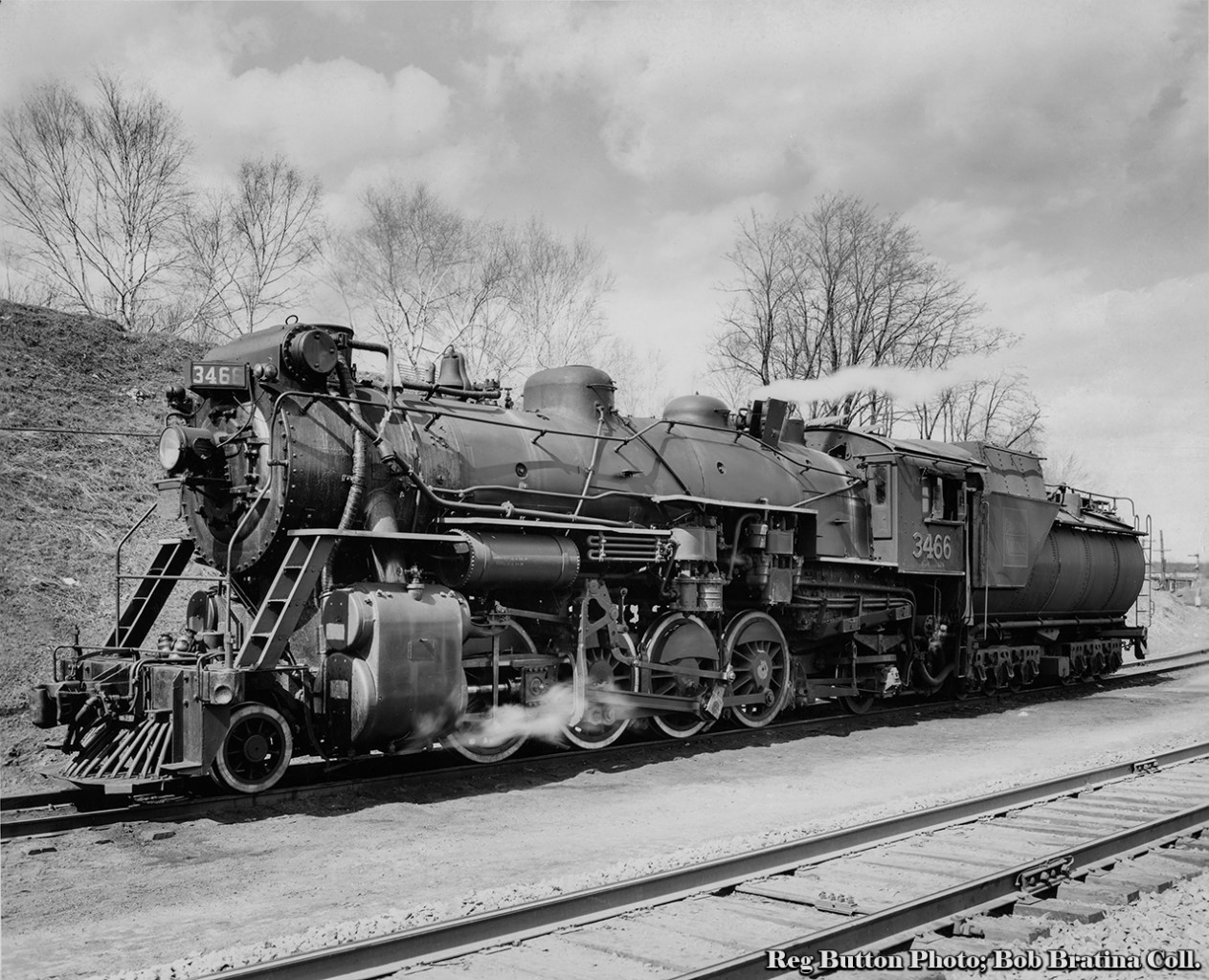 CNR S-1-f Mikado, 3466, waits on the helper track at Bayview Junction ready to assist the next heavy train upgrade through Dundas.  Note the marker lanterns on the front walkway, and at far right, the semaphore at the junction with the Oakville Subdivision, and the old Spring Gardens Road bridge.  Built by MLW 1913 as GTR 561 it was renumbered CNR 3466 1923, and finally scrapped in 1959.