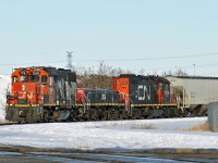 GP38-2 CN 7518 GP9RM CN 7201 and YBU 204 switch cars into the Alcan Spur by the Strathcona Science Park in Clover Bar.