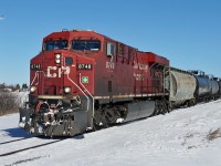 ES44Ac CP 8748 makes it's way west on a snowy Scotford Sub.