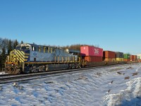 Ex CitiCorp ES44AC, now CN 3969 heads an intermodal east away from Clover Bar.