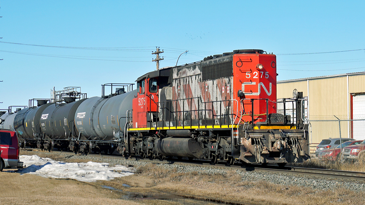 CN 5275 is switching tank cars at the Lloydminster yard.