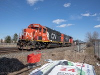Just as CN L518 waits for trains to pass, after 20 or so minutes of waiting the crew finally gets their clear to go westward, from Kingston back to Belleville. In the lead is GTW 6425 which is now painted in CN, and CN 4770 still a cool leader to see even though it’s repainted. If you look closely at the details, you can see some hint of GTW underneath the red.