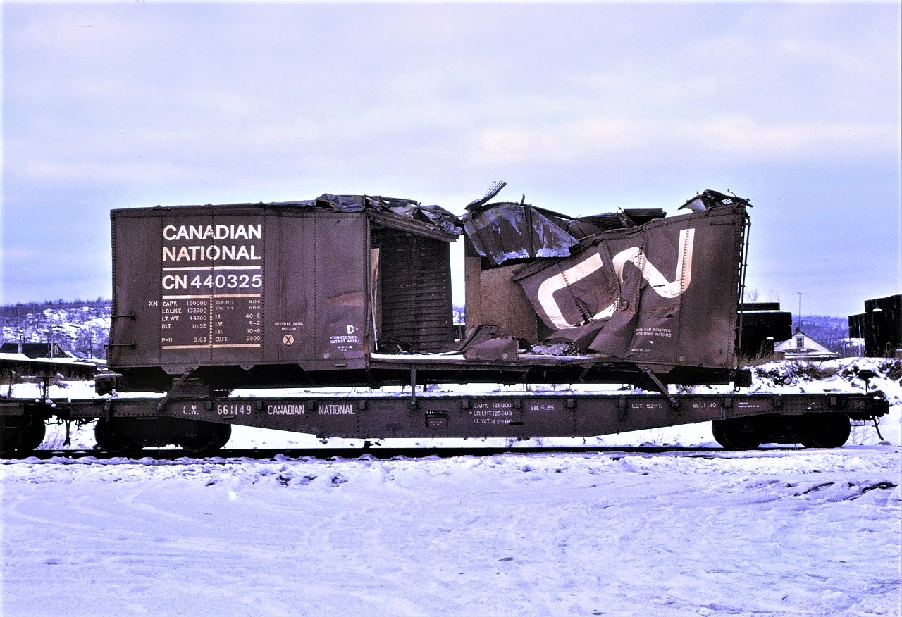 It appears that CN 440325 has reached the end of its useful life!!! Born in October 1952, rebuilt in May 1963, and met its end in December 1966.  The "X" is now an appropriate classification for this car.