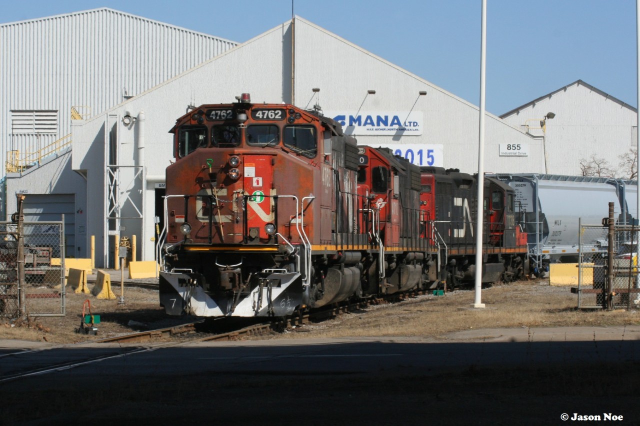 CN 4762, 4710 and 7038 are assigned to the CN 0700 Job as they work the MANA facility (Max Aicher North America) in Hamilton during a sunny afternoon.