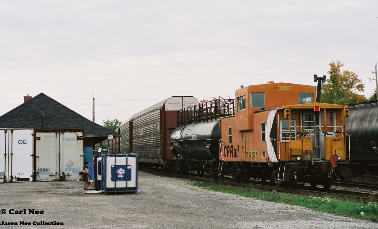 More than a decade after cabooses were removed from active mainline service, here CP 422992 is viewed bringing up the rear of a westbound as it passes the Galt station on the Galt Subdivision.
