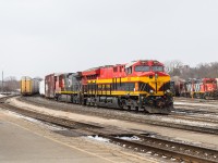 CN 274 sits in the Brantford Yard with KCS 5015 leading to make an 18 car lift as L580 works with the CN 4713.