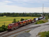 CP ES44AC #8765 leads PRLX SD70MACs #3927 and #3964 up the Canadian Pacific Mactier Subdivision on CP 421 as it passes by the Vaughan Intermodal Terminal.