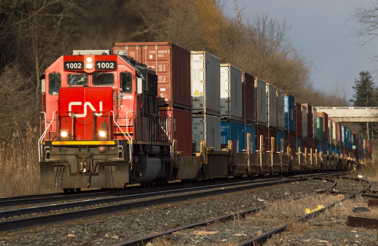 IC 1002 leads Q187 upgrade at Copetown amid the last sun of the day on what was a mainly snow squall and cloud filled day.