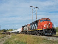 A clean CN 5350 and a less than stellar looking 5242 lead train 512 down the final stretch of the Beamer Spur toward Scotford Yard.  