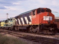 Another image from Vernon. Omnitrax was famous for moving its motive power between all of its operations. Case in point is Hudson Bay Railway M420 3550 as well as HBR 2506 (a former SP GP20 rebuilt into a GP9). Trailing is a Carlton Trail GP10. The last two units also wear Central Kansas RR lettering just to confuse things even more. Nevertheless this was a colourful operation while it lasted. From what I can tell the line they ran over is still intact but not used as CN is the sole surviving railroad today in Vernon. 