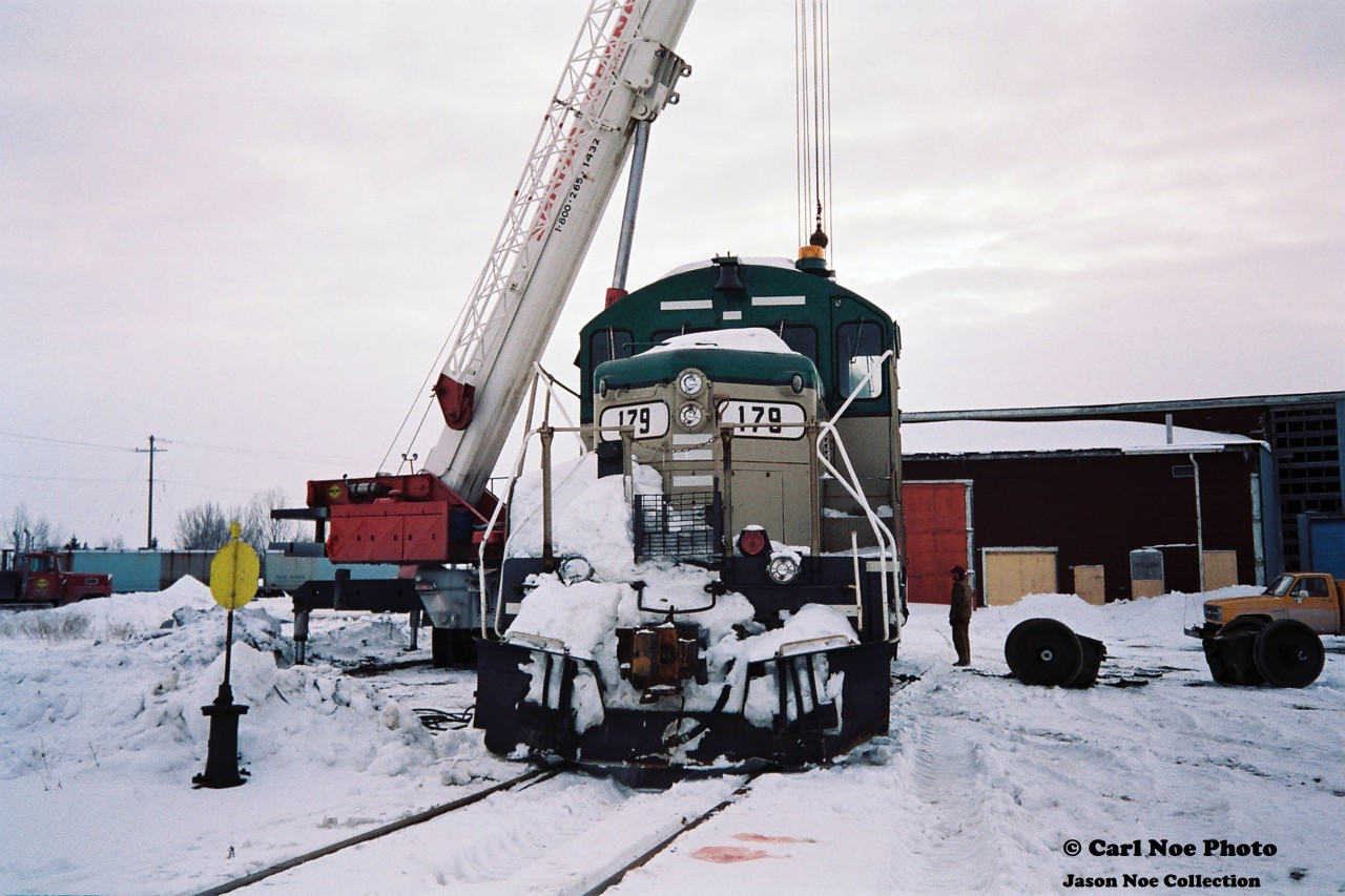 Goderich-Exeter Railway (GEXR) GP9 179 undergoes some emergency traction motor repairs near the location of the CN roundhouse at Stratford Yard. The winter of 1993-1994 was a brutal one for GEXR's fleet of second-hand GP9’s and by early February, most were either out of service or severely ailing, which forced RailTex to lease power or transfer from their other operations.