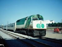An eastbound commuter train with GO Transit 515 enters Union Station in downtown Toronto, Ontario with F40PH 515 during an early morning in August 1981. GO 510-515 were built by GMDD and they were the first F40PH's ever to be built in Canada in 1978.
