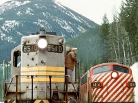 Due to extreme rock slides in the Kicking Horse Canyon The Golden switcher has run protection run to Leanchoil
and on the return to Golden sits in the clear at Glenogle siding to let No.1 "The Canadian" overtake