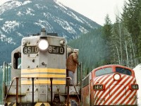 Due to extreme rock slides in the Kicking Horse Canyon The Golden switcher has run protection run to Leanchoil
and on the return to Golden sits in the clear at Glenogle siding to let No.1 "The Canadian" overtake