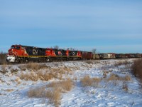 Back from the dead?  This week, CN has moved approximately 10 Dash 8's from storage in Winnipeg to Edmonton.  I'm not sure if the units will ever see revenue service again, but it was nice to see the 2128 and 2021 on X 31741 07.