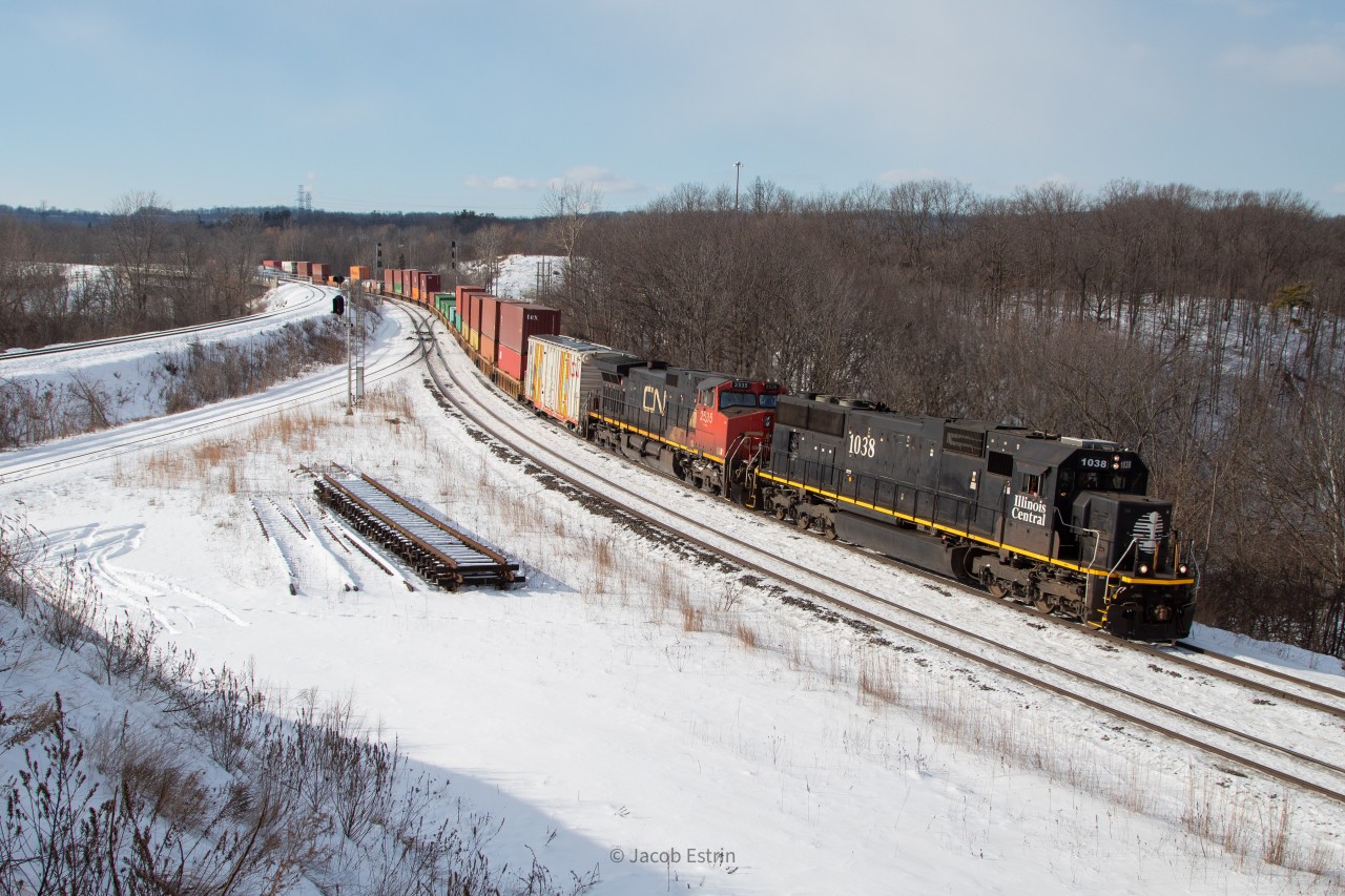 IC 1038 is in the lead of Z148 as it bends around the curves at Bayview Junction.
