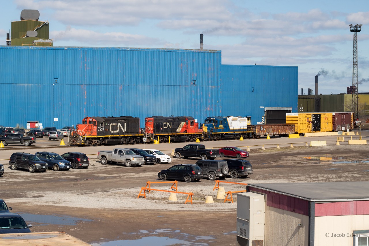 Shortly after lifting SOR 4003 the 0700 Yard job from Stewart is seen backing into Stelco to lift a large cut of steel coil cars.