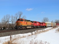 It's a beautiful sunny day and Canadian Pacific gave us a very nice train to shoot.  BNSF 4418 with CP 6255, CP 3053 and a mid dpu CP 9683 power a very late CP 141 up to the Victoria Road crossing as they head west up the Galt sub.