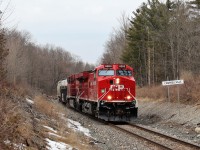 Interesting that Mr. Host posted a photo of CP 8203 in its GP9u days a little earlier and here is a later version with new paint from the former AC4400CW (CP 8514) now refurbished and renumbered to AC4400 CWM, CP 8203 as it passes the Campbellville sign on its way south down the Hamilton sub.