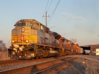 CP 235 backs up into into the Jefferson siding at Walkerville JCT with 7010 in golden hour... After getting told that 235 went into emergency near Tilbury, I had doubts that I was going to be able to see this train during the daylight hours. I was very close to leaving after hearing the news but decided to stay and wait it out. I got lucky with the lighting as it was mostly cloudy for most of the day in Windsor but it decided to clear up as 235 was making its way here.