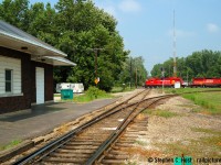 It's a hot sweaty and hazy July afternoon. I got up at 0600 in Sarnia to chase D725 from Sarnia to Chatham for the first time and my last photo before Chatham was <a href=http://www.railpictures.ca/?attachment_id=20656 target=_blank>This one</a>. I had my first car, a Toyota Tercel and there was no air conditioning unless I drove with the windows down, and now I'm wandering around the Chatham area CSX line looking at stuff in this putrid heat. I make my way to the Chatham station and engine house to explore, and I found a pair of CSX units by the engine house waiting for D724 but I had to get back to the station. Without knowing, I heard the groan of a pair of engines coming westbound and got in position as quickly as I could to get a snap and this is the result - a pair of SD40-2's from the same series, one ex SOO and a SOO<br><br>
These were the days before many people really carried cell phones, or mobile data for that matter (I was one of the few exceptions) and information did not flow as freely as it does today. I had no idea what was coming nor cared - my attention was on the CSX. Not long after this shot, the CSX Clerk in the station 'Skip' Dunn, took pity on me and invited me in to cool off and gave me some waters. Bless his heart, for he let me wander around and do whatever I wanted and the relief was very appreciated. While the crew worked to build their outbound train and Skip helped them out with paperwork, etc, I continued to stay cool in the Chatham Station until the northbound departed for Wallaceburg with a new pair of units. I had live chat with friends on my Blackberry (JMIRC) and after telling them how friendly everyone was, the next day,a few friends met up with me in Sarnia to <a href=http://www.railpictures.ca/?attachment_id=8912 target=_blank>repeat the chase</a> . Skip was just as hospitable and invited the whole crew in, and  would continue the hospitality every time I saw him. Within 7 months these rails would fall silent and remain so today with an uncertain future. Skip unfortunately passed not long after he retired from CSX and many of these guys retired after the downsizing of the CSX Canadian division in 2006. I'll share more pictures of this down the road, I have quite a collection :)