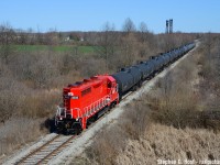 North of Port Colborne town limits, JLCX 3502 rolls west on the former CNR Canal Subdivision with a string of tanks from their cash cow, the Verbio biodiesel plant. You can see the switch in the distance for the Port Colborne Harbour Railway (PCHR) which GIO/Trillium also operates, as well as Bridge 17 in Dain City. Funny enough, we weren't supposed to see JLCX 3502 here, it was acquired for use on the GIO Rail Orangeville operation due to it having dynamic brakes. When the town became sour on the relationship of continuing to operate the railway, the decision was made to not bother sending it, so off to Welland it went.