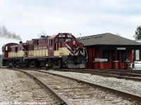 Hostler/Mechanic Apprentice Tom Nichol rides on RS-18 181 as the mechanical crew shuffle power around preparing for the 1400 job which would be on duty soon. I brought a little something with me from the collection of the <a href=http://www.ghra.ca>Guelph Historical Railway Association</a> to pose it on the station beside the recently placed OSR signs. Located near the site of the old Guelph Junction Station, this building was built in 2016-2017 by OSR to provide crew and office quarters. It's still there, still owned by OSR and leased to GEXR (but on GJR property, it's complicated!) but the Guelph Junction signs were removed by OSR upon their departure. G&W safety signs now adorn this building typical of their usual corporate branding and safety culture awareness strategy. 