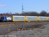 The Southern Ontario Railway (RLHH Reporting marks) 0800 job is emerging out of the hole after fetching a cut of brand new CSX fully built autoracks from National Steel car. In the background is the maritime inspired sail structure in Bayfront Park. This was rather unique as when NSC does autoracks they usually only do the flatcar where some other company puts on the shell. This was one of the few times that I can remember NSC did full autoracks and made for a rather unique sight. And zero graffiti :)