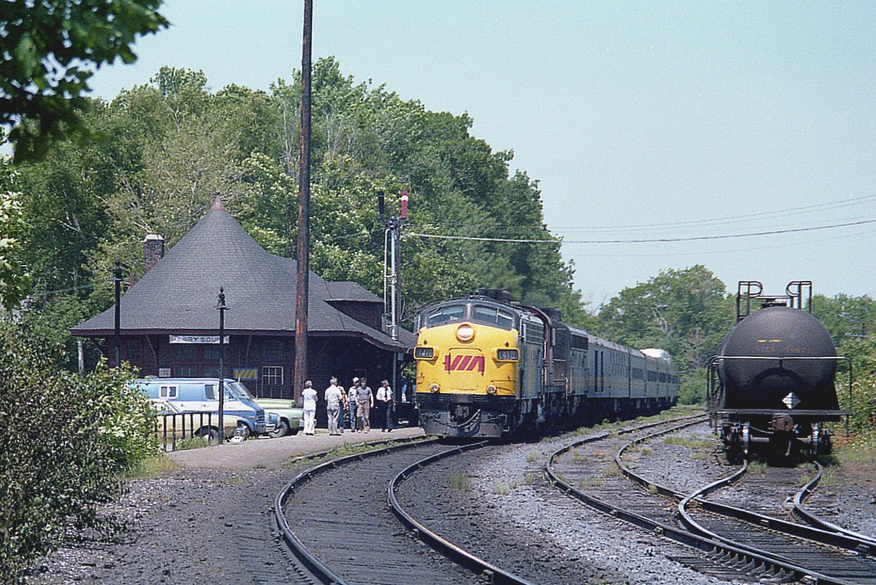 Stopping at Parry Sound CP station is the Sudbury - Toronto portion of transcontinental passenger train. I note it in this manner as I am not sure if this is the Canadian or the Super Continental as there were number changes and name changes during June of 1979.  Confusing.
Anyway, this southbound has VIA 1410 up front (X-CP) with CP 8580 RS-10s) and CN/VIA 1961 (B unit)  trailing. An odd combination.