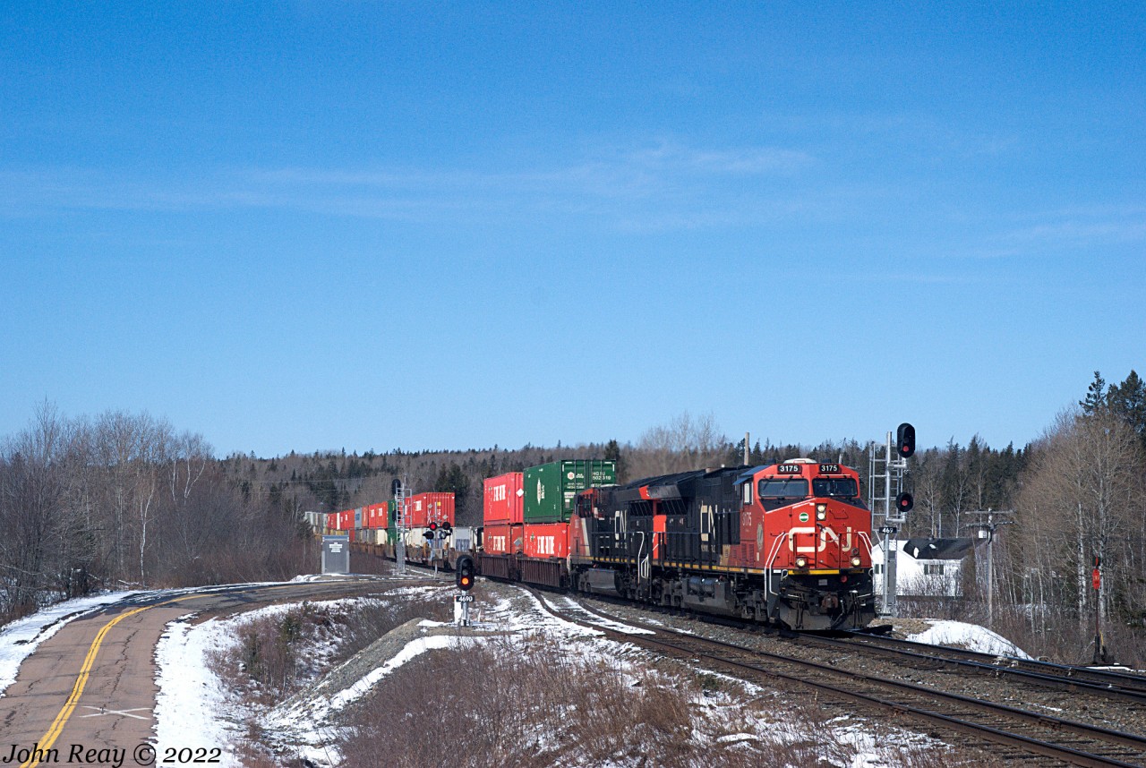 March 30th 2022 @ 11:46, CN Z120 by Oxford Jct, NS (MP 46.9 CN Springhill sub) with 502 axles and CN 3175, CN 3068 + DPU CN 3242. Friendly engineer.