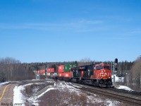 March 30th 2022 @ 11:46, CN Z120 by Oxford Jct, NS (MP 46.9 CN Springhill sub) with 502 axles and CN 3175, CN 3068 + DPU CN 3242. Friendly engineer.
