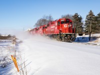 A quartet of red CP geeps takes a handful of racks from Wolverton to Hagey, a usual morning operation around these parts. These guys were going track speed, so it caught us off guard that we had only just barely beat him here.