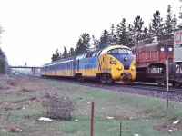 <br>
<br>
   TEE time at Oriole.
<br>
<br>
   And like most passenger equipment of that time – recycled. 
<br>
<br>
   This one recycled from Europe courtesy the Ontario Government.
<br>
<br>
   A northbound CN transfer holds the main as the Northlander powered by the 1957 built  Werkspoor  'TEE' renumbered ONR 1983 (ex 1903)  rolls through on the siding non stop to Union.
<br>
<br>
   ONR 122 at CN Oriole May 6, 1979 Kodachrome by S.Danko.
<br>
<br>
   Near the Junction of the former CNoR branch to Leaside – Mile 10.9 Bala Subdivision. The switch to the CNoR  aka  CN Leaside Branch was from the Oriole service track ( behind the photographer) westward to CP Rail Donlands on the Belleville subdivision.
<br>
<br>
   note: GO Oriole is at mile 12.1 Bala Subdivision
<br>
<br>
   sdfourty