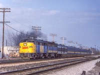 VIA 6770 is accelerating in Scarborough, Ontario on March 23, 1982. 