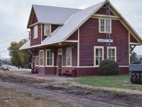 <br>
<br>
   The 1884 built  OA&PS station is today a Visitor Information centre and Art Gallery, post mail address 19503 Opeongo Line 
<br>
<br>
   The rail line ( Ottawa - Whitney) hosted several fan excursions (  including  x CPR #1201 )  through the seventies,
<br>
<br>
    rails pulled just prior to this Kodachrome
<br>
<br>
   At Barry's Bay, September 23, 1986 Kodachrome by S.Danko
<br>
<br>
   At left is a VW Jetta on the Opeongo Line.