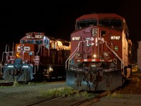 The time is 00:23 and things are pretty quiet around the shop tracks at Sutherland as two distant generations of locomotives rub shoulders. 2003 built AC440CW 9767 and 1989 rebuilt GP9u 8232 await their next call to action.  The 8232 was assigned to the TEC train at the time and was touring much of the west. 