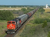 CN 8809 West passes the small village of Kinley Saskatchewan. While Kinley is no longer an identifiable location on the CN time table, it's name beginning with a K is no coincidence as it is situated between sidings Juniata and Leney on the former "alphabet railroad" better known as the GTP. 