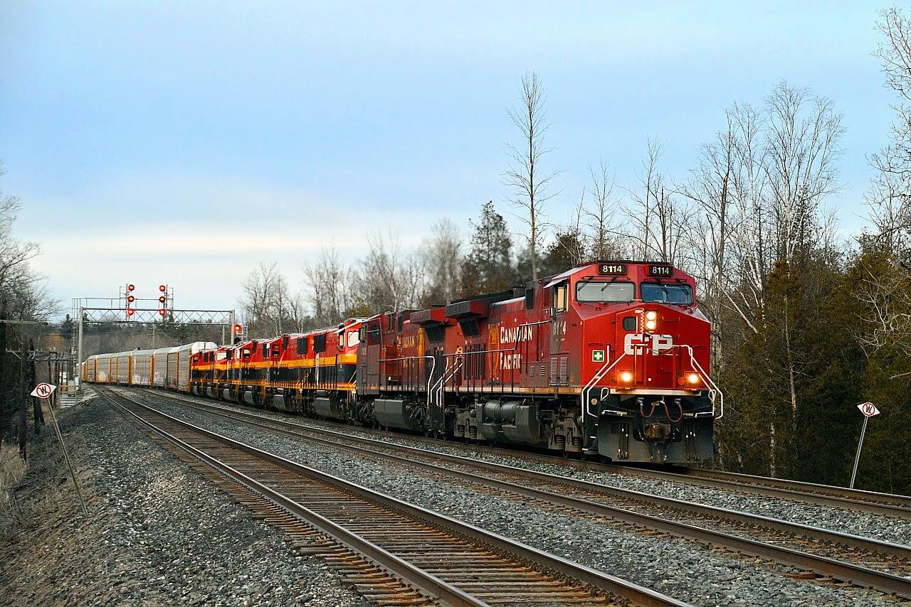 Awh, geez. If it isn't one thing or another that slows down the CP as they go about their daily business. We were almost thinking to give up ...... but after 3 hours? No, wait it out.  So finally as the sun is behind the clouds and the day is winding down, about 1915 hrs the 'catch of the day' finally shows up. CP 8114, 8129, and six x-KCS, all marked for Progress Rail (PRLX) in tow...3927, 3947, 3951, 3918, 3926 and 3964.  Followed it down to Newman Rd (Dundas) just because it was on the way home, but dusk had settled in by then.