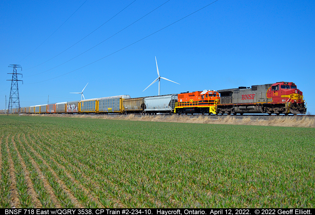 CP Train 2-234-10 rolls eastward through the Essex County flatlands on April 12, 2022 with BNSF 'Bonnet' #718 and freshly rebuilt QGRY GP38-2 #3538.  BNSF 718 had arrived in Windsor around 0830 and lifted the QGRY 3538 and cars in Windsor while waiting on a late running 131 to arrive.  All the better as it allow the sun to get further around for better lighting.  Considering it's been raining/snowing the past few days, and it's supposed to continue through Easter weekend, I'll take a nice day with a rare consist!!!