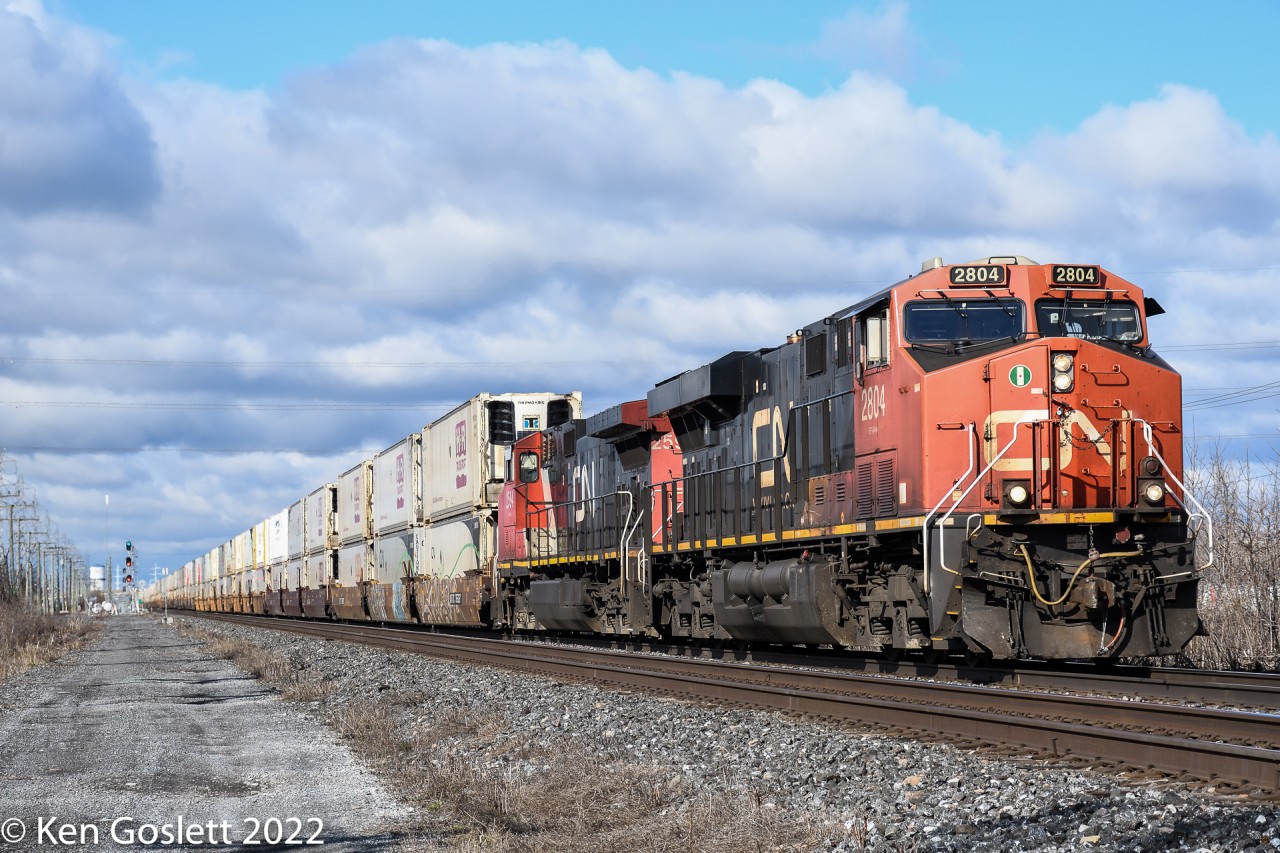With stacks from western Canada 108 approaches the end of its run at Montreal's Taschereau Yard.