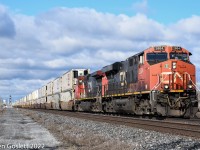 With stacks from western Canada 108 approaches the end of its run at Montreal's Taschereau Yard.

