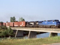 This was the only time I managed to catch a LMSX Dash-8 leader on NS trains 327/328. Originally the LMS Dash-8’s were split between Conrail and CN. The breakup of Conrail would split half of the fleet between NS and CSX, with CN retaining the rest. This day I caught up with NS 328 just outside of Port Robinson crossing Welland River, on it’s way to Buffalo NY.