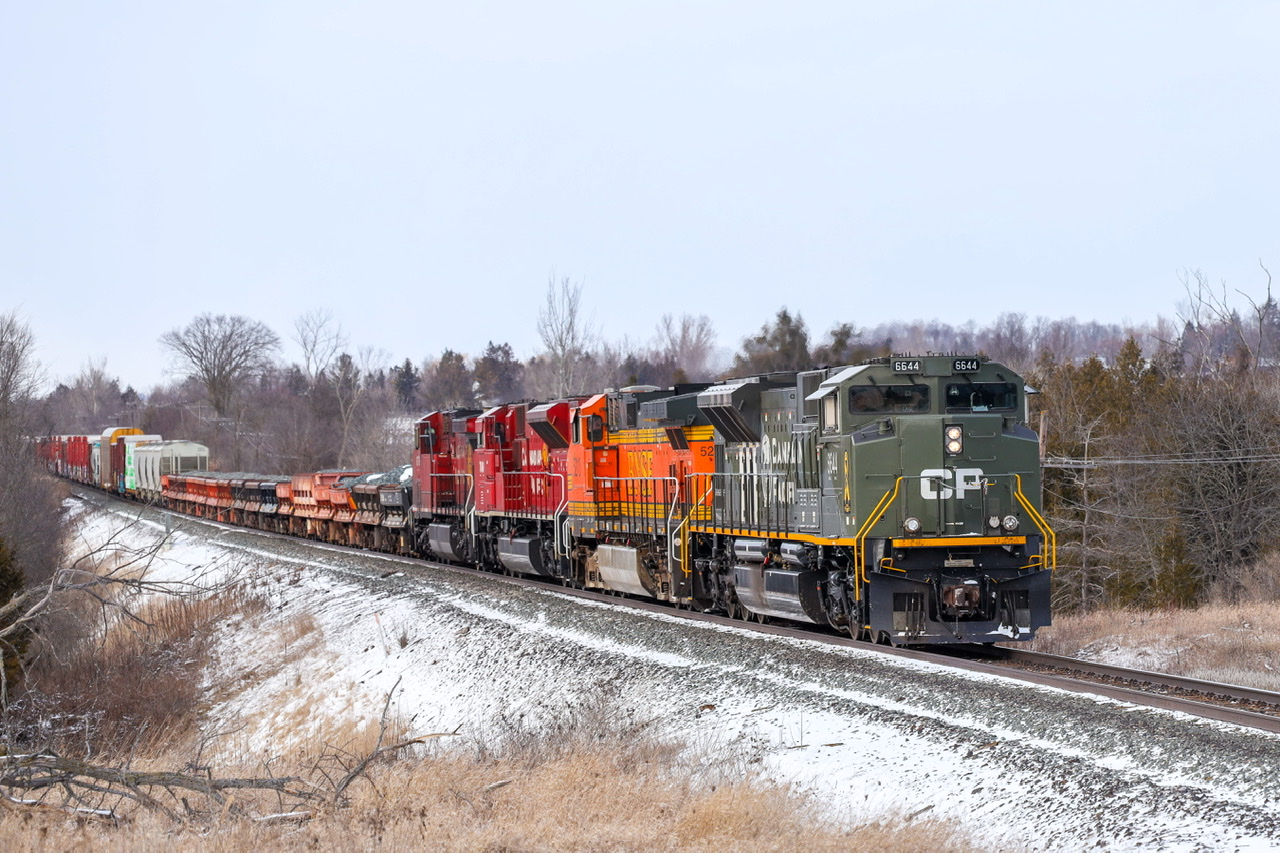 CP military tribute unit ‘D-day’ CP 6644 leading CP 220, BNSF 5210, CP 7049 and CP 9779 trailing, at Mile 36 Mactier Sub.