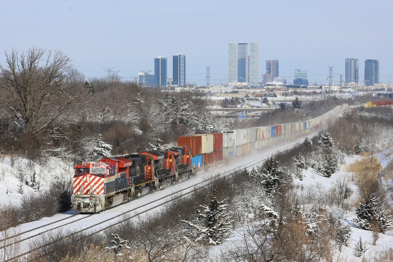 2022.02.04 CN 3115 leading CN 121, going over the Humber bridge