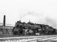 Snapped just east of Lottridge Street, CNR northern 6262 brings a freight into Hamilton from the Niagara region, passing alongside Frost Steel & Wire Company Limited.  6262 was the third last Northern built for the CNR, being one of thirty U-2-h class locomotives built by MLW in February 1944.  It would be scrapped just sixteen years later in February 1960.<br><br>Frost Steel & Wire, founded by Henry L. Frost, began their operations in Welland in 1898.  The company moved to Hamilton in 1904, with their site at the corner of Sherman Avenue and Princess Street.  They would expand over the coming decades, eventually giving them the entire block on Princess from Sherman to Lottridge Street.  In 1926-27 the company would expand across Lottridge Street, purchasing the R. A Lister & Company Limited property on the north side of the CNR Grimsby Sub for their head office (250 Lottridge) and further manufacturing.  An old loading dock remains today <a href=http://www.railpictures.ca/?attachment_id=43779>alongside the railway</a> and can be seen in a 50th anniversary promotional image <a href=https://scontent-yyz1-1.xx.fbcdn.net/v/t31.18172-8/14524557_1276076015744022_38169071197502980_o.jpg?_nc_cat=101&ccb=1-5&_nc_sid=cdbe9c&_nc_ohc=4HDxhDQPgxQAX8Nge8I&_nc_ht=scontent-yyz1-1.xx&oh=00_AT9aJHLSzkNqyVFc2012r_Q9V71UKPqpjh_E4dd1LOHvmQ&oe=628030AC>found here.</a>  Frost would shut it's doors in 2002, but it's former head office building still retains the Frost Steel & Wire Products Limited sign on the south side facing the railway.