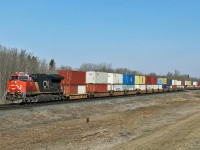 ET44AC CN 3098 heads an intermodal eastbound through Ardrossan