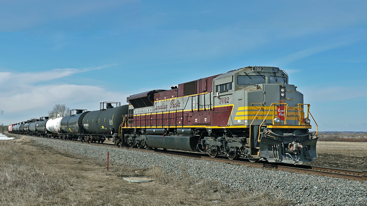 Heritage paint with script lettering, SD70ACU CP 7012 is the rear DP on the local transfer from Scotford to Edmonton.